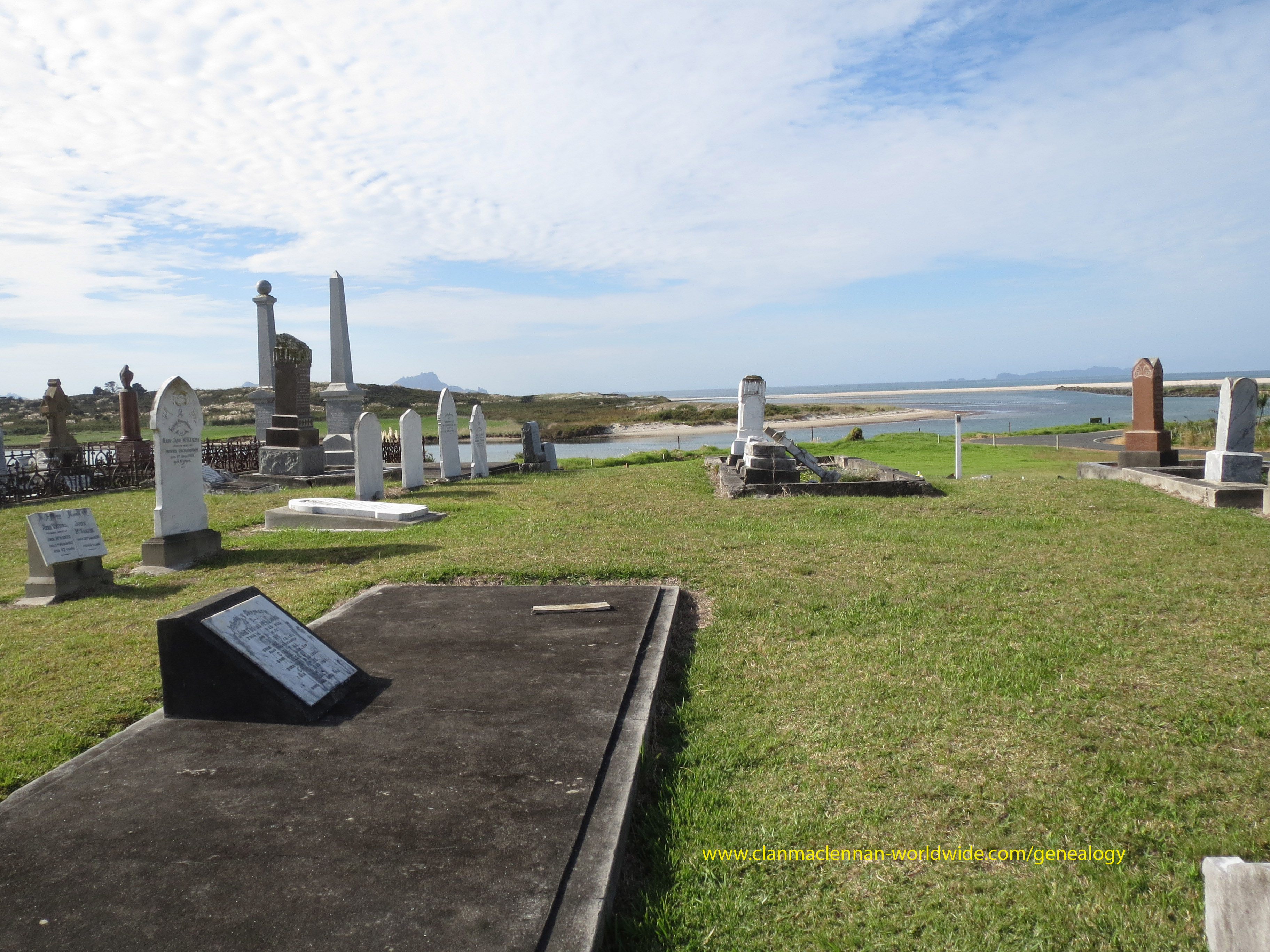 Photo of headstones/John Thomas McLennan d1883 & fam grave setting Waipu